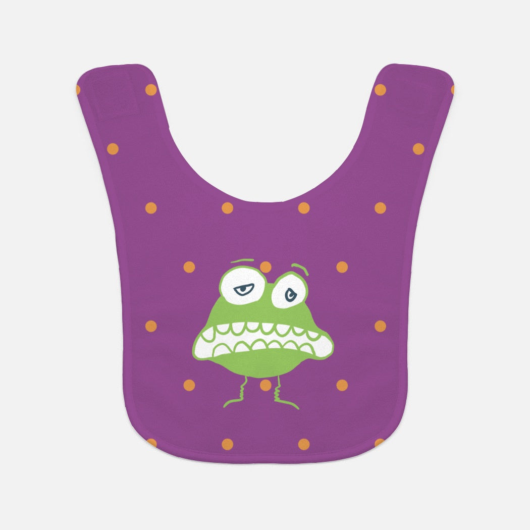 Greedy Goblin Baby Bib. Purple bib with  orange polka dots with funny green cartoon character.